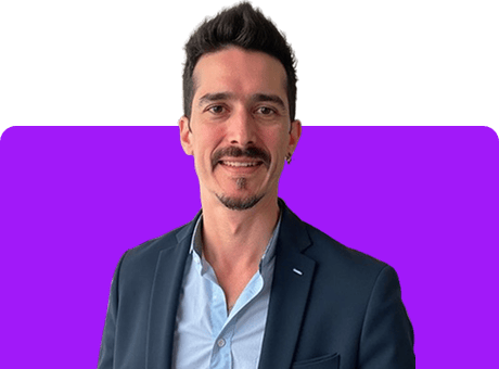 A professional man in a suit with a confident smile, representing versatility and expertise in various trades and skills, perfect for the Mind of All Trades brand.
